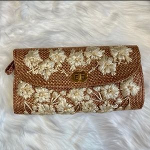 Woven embroidered clutch